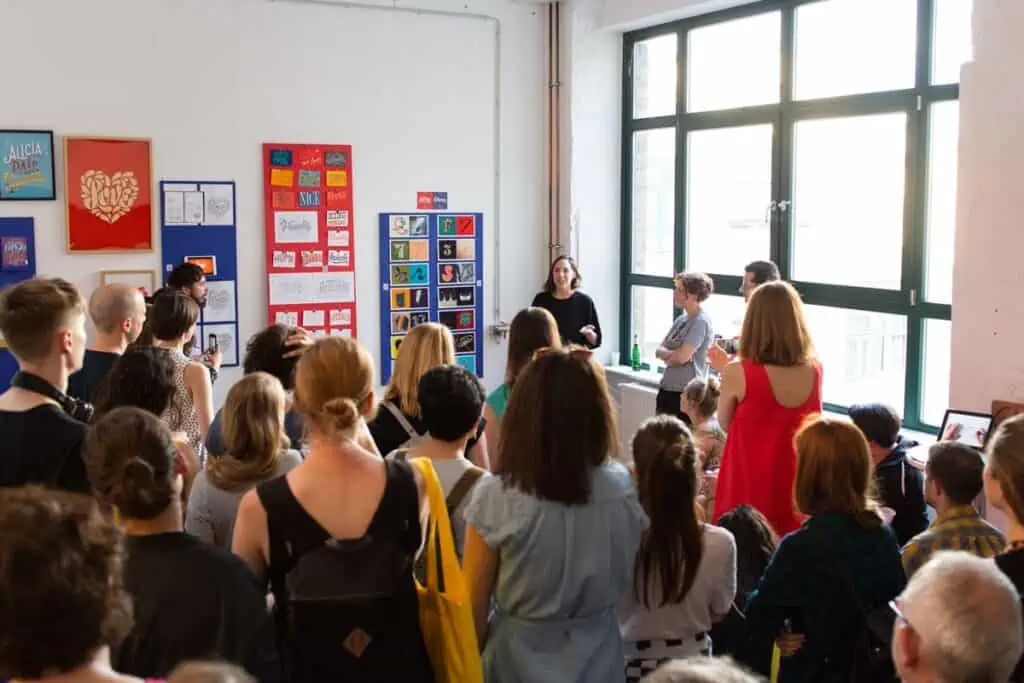 Martina Flor giving a lettering presentation