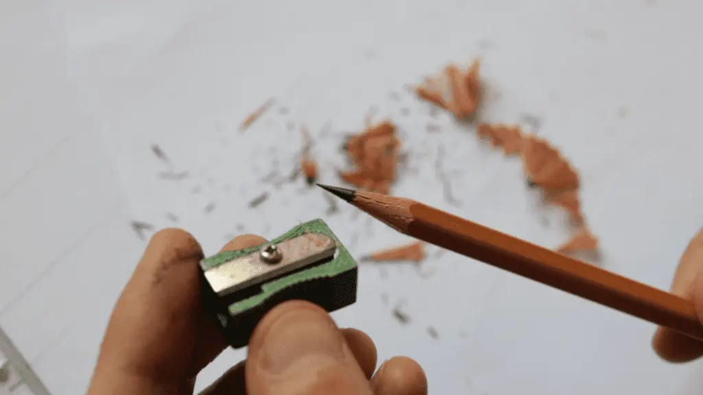 Prepare the pencil by sharpening it. 