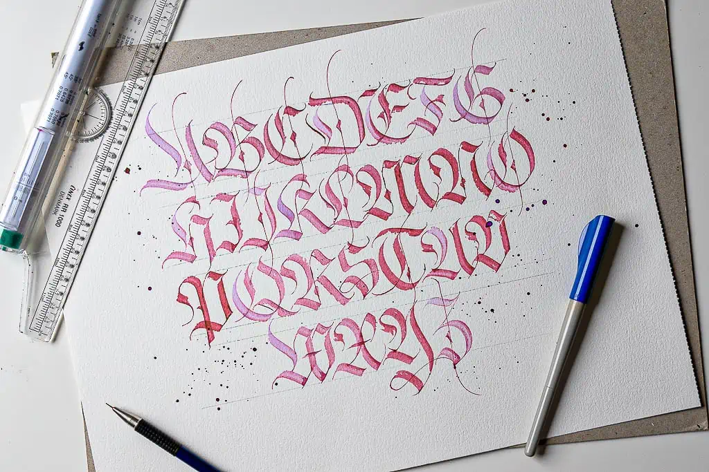 Finished piece - Custom blackletter alphabet on watercolor paper. 