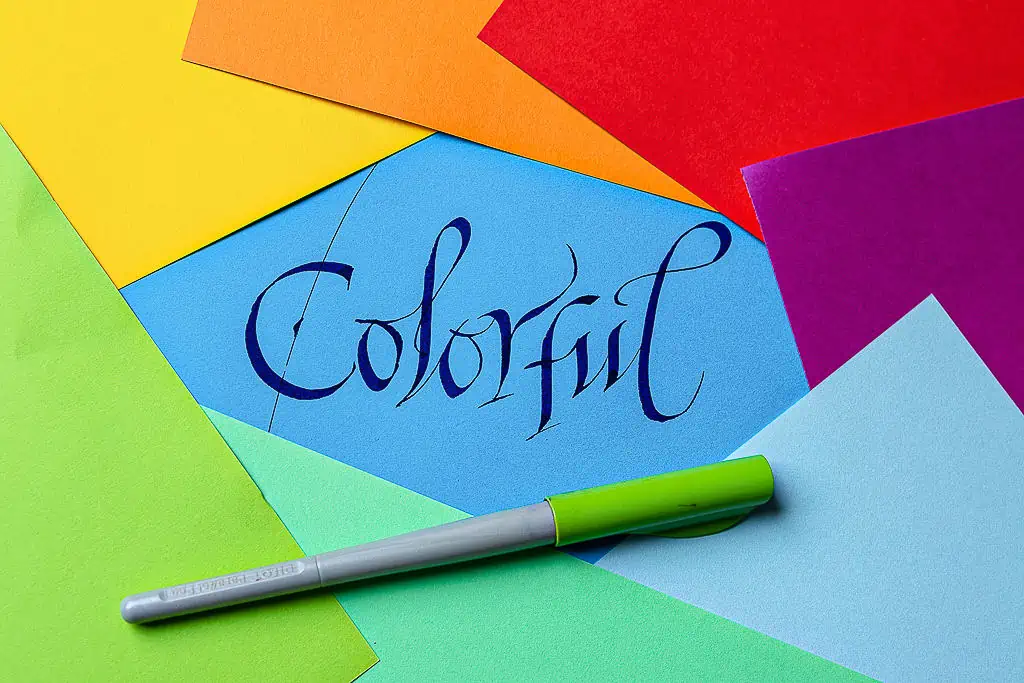 Calligraphy on colored paper. 