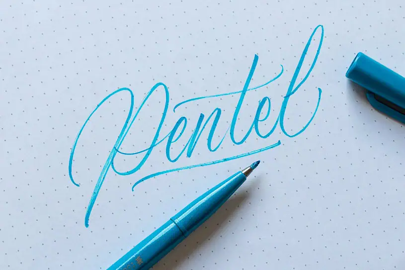 Blue brush calligraphy with Pentel brush pen. 